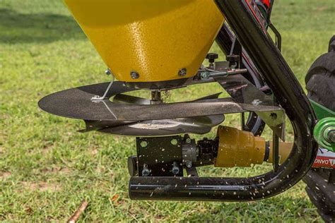 seed spreader for skid steer|tractor mounted fertilizer spreaders.